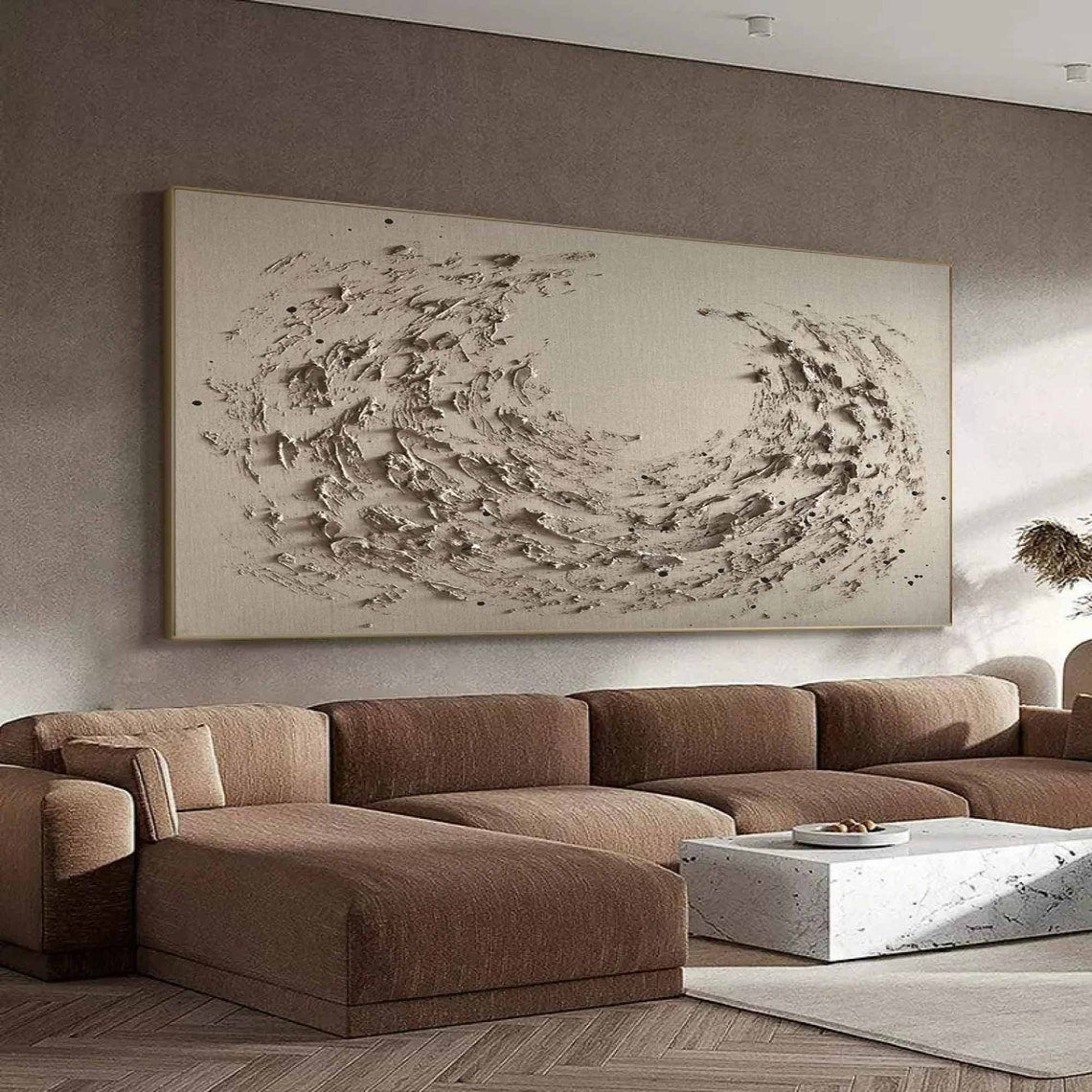 Textured abstract wall decor featuring dynamic swirling design in neutral tones.