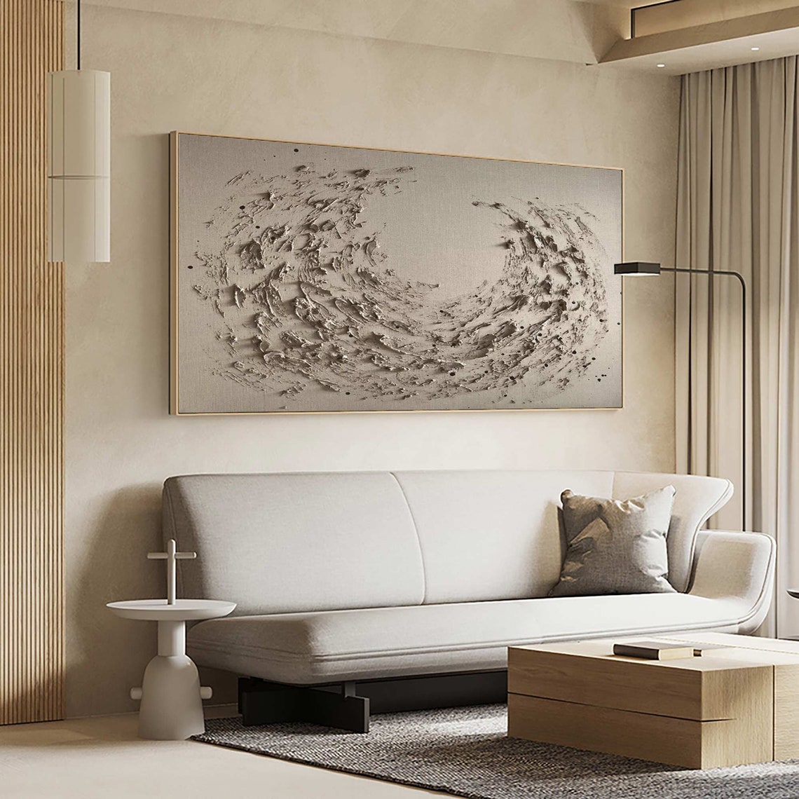 Textured abstract wall decor featuring dynamic swirling design in neutral tones.