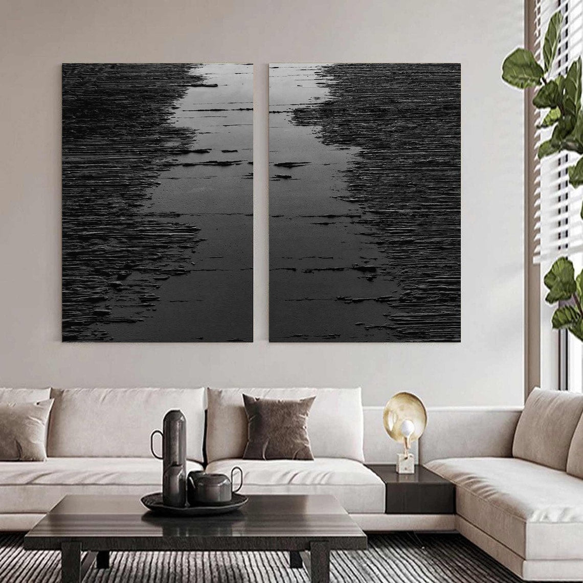 Black abstract wall art diptych with raised strokes creating a wave-like texture.