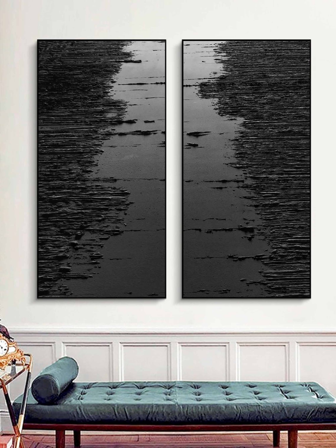 Black abstract wall art diptych with raised strokes creating a wave-like texture.