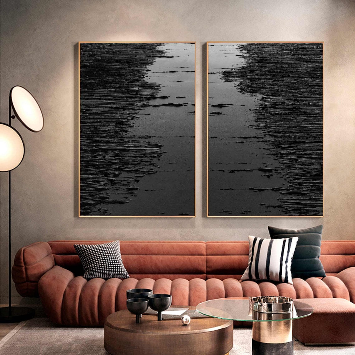 Black abstract wall art diptych with raised strokes creating a wave-like texture.