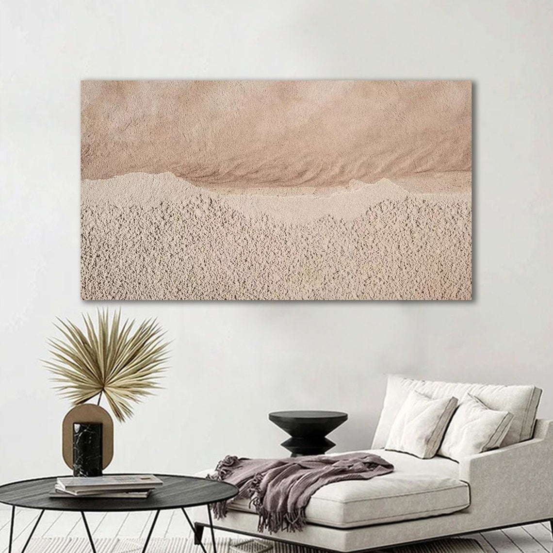 Neutral textured abstract wall art in sandy beige and muted pink tones with tactile surface.