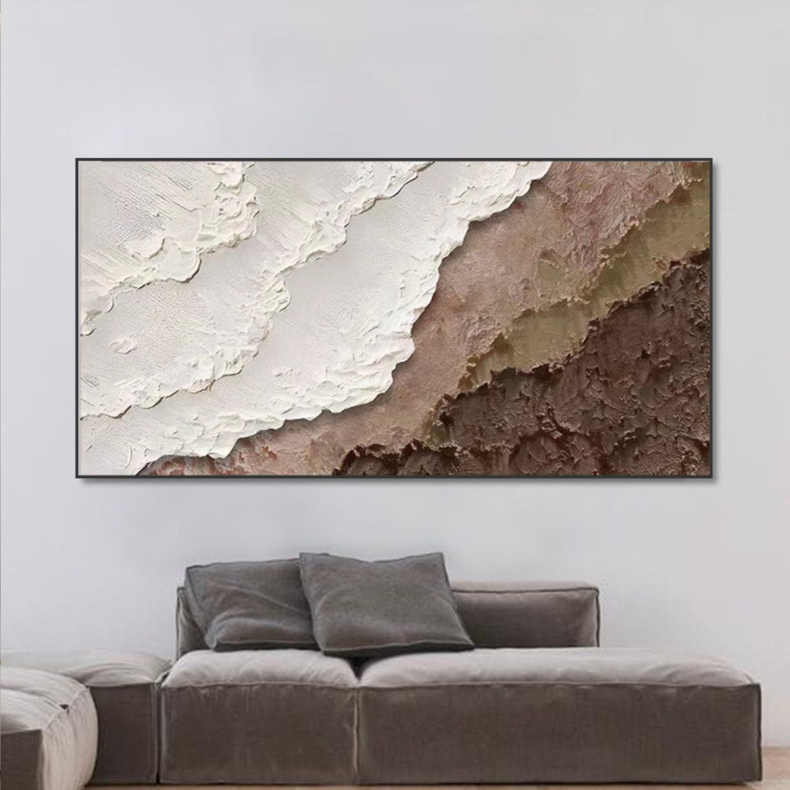Natural earth tone abstract wall decor with layered textured patterns in beige, white, and russet tones.