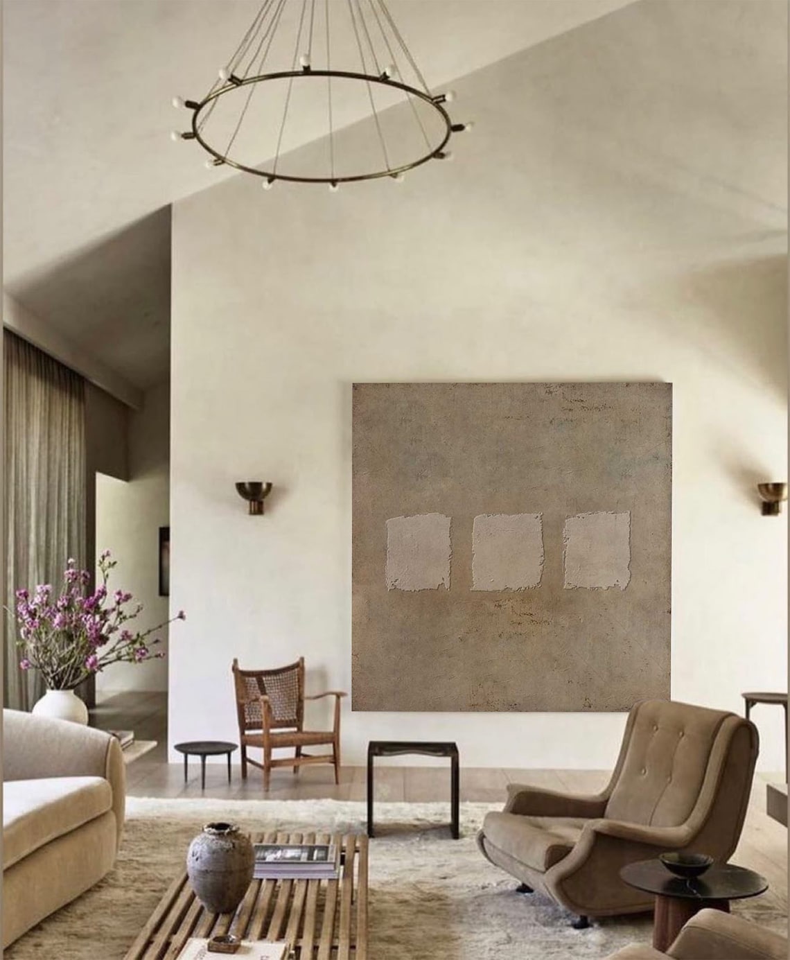 Wabi-sabi abstract textured wall art with three minimalist square patches on earthy taupe canvas.