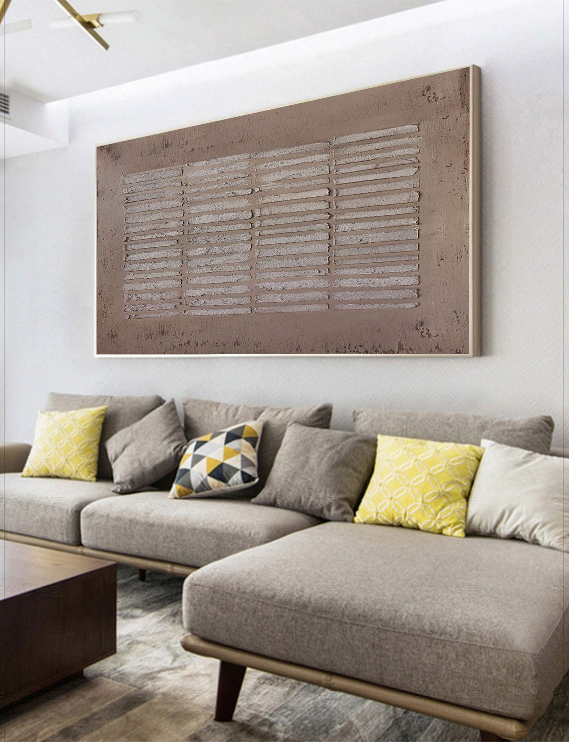 Geometric abstract wall art in earthy tones with textured linear patterns.