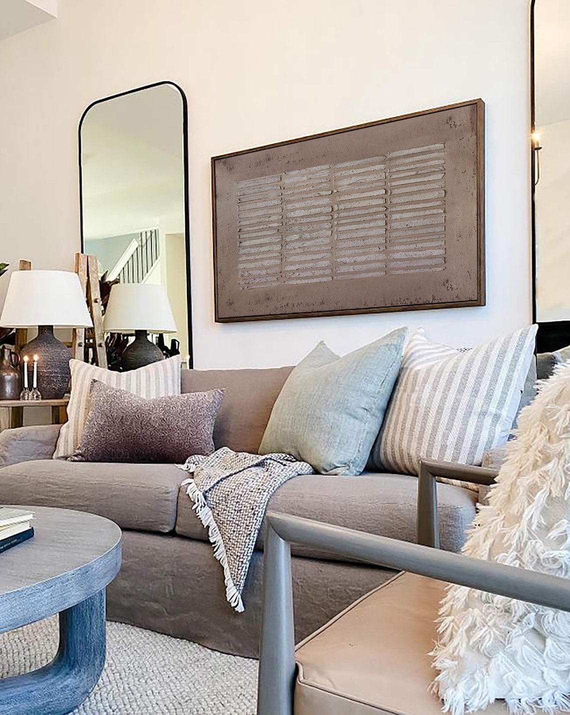 Geometric abstract wall art in earthy tones with textured linear patterns.