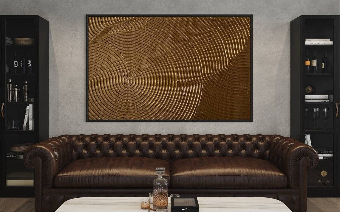 Gold textured abstract wall art with circular 3D patterns and rich golden tones.
