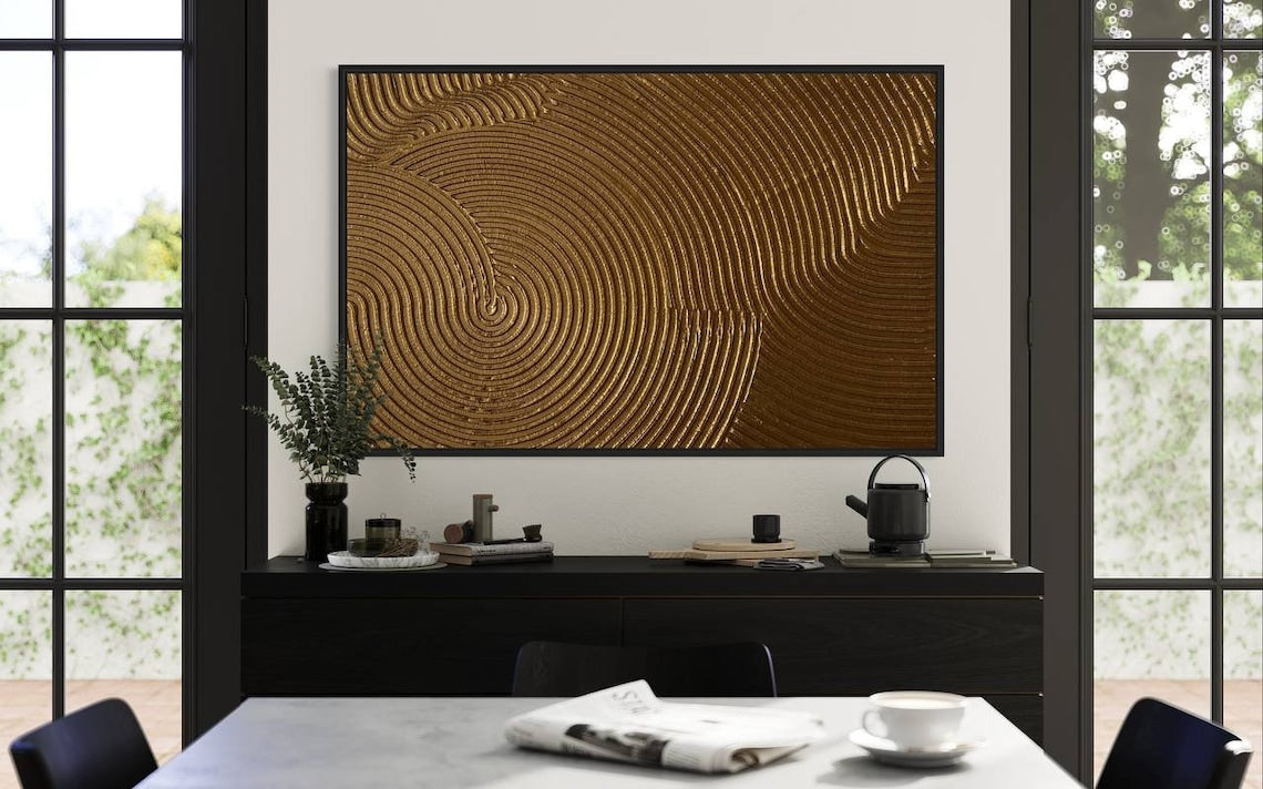 Gold textured abstract wall art with circular 3D patterns and rich golden tones.