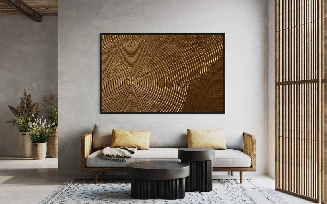 Gold textured abstract wall art with circular 3D patterns and rich golden tones.