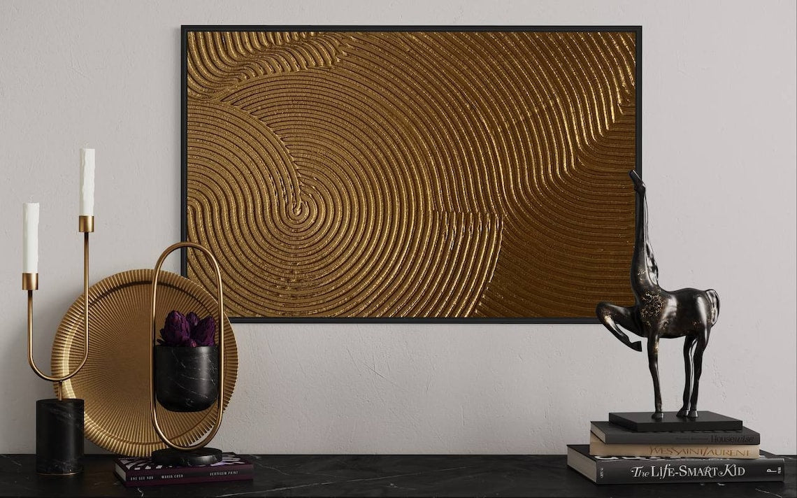 Gold textured abstract wall art with circular 3D patterns and rich golden tones.