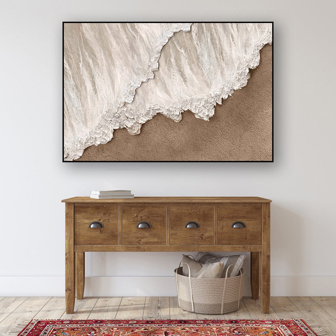 Neutral ocean abstract wall decor with textured white waves meeting sandy shore.
