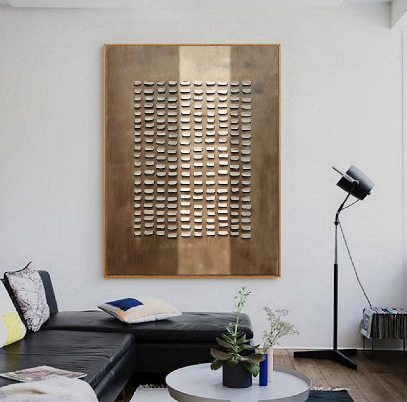 Modern minimalist art with uniform cutouts on a brushed bronze finish canvas.