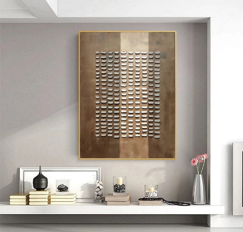 Modern minimalist art with uniform cutouts on a brushed bronze finish canvas.