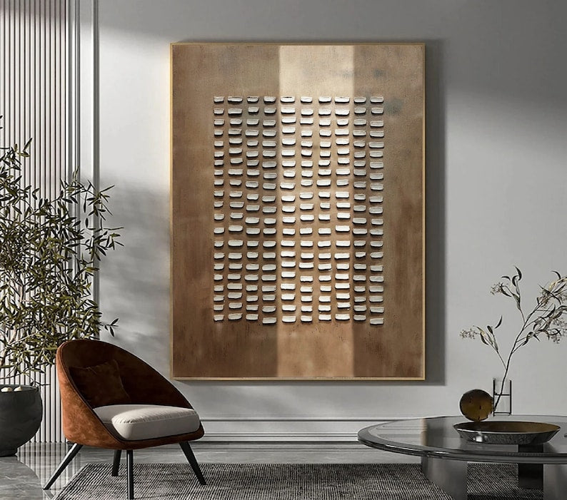 Modern minimalist art with uniform cutouts on a brushed bronze finish canvas.