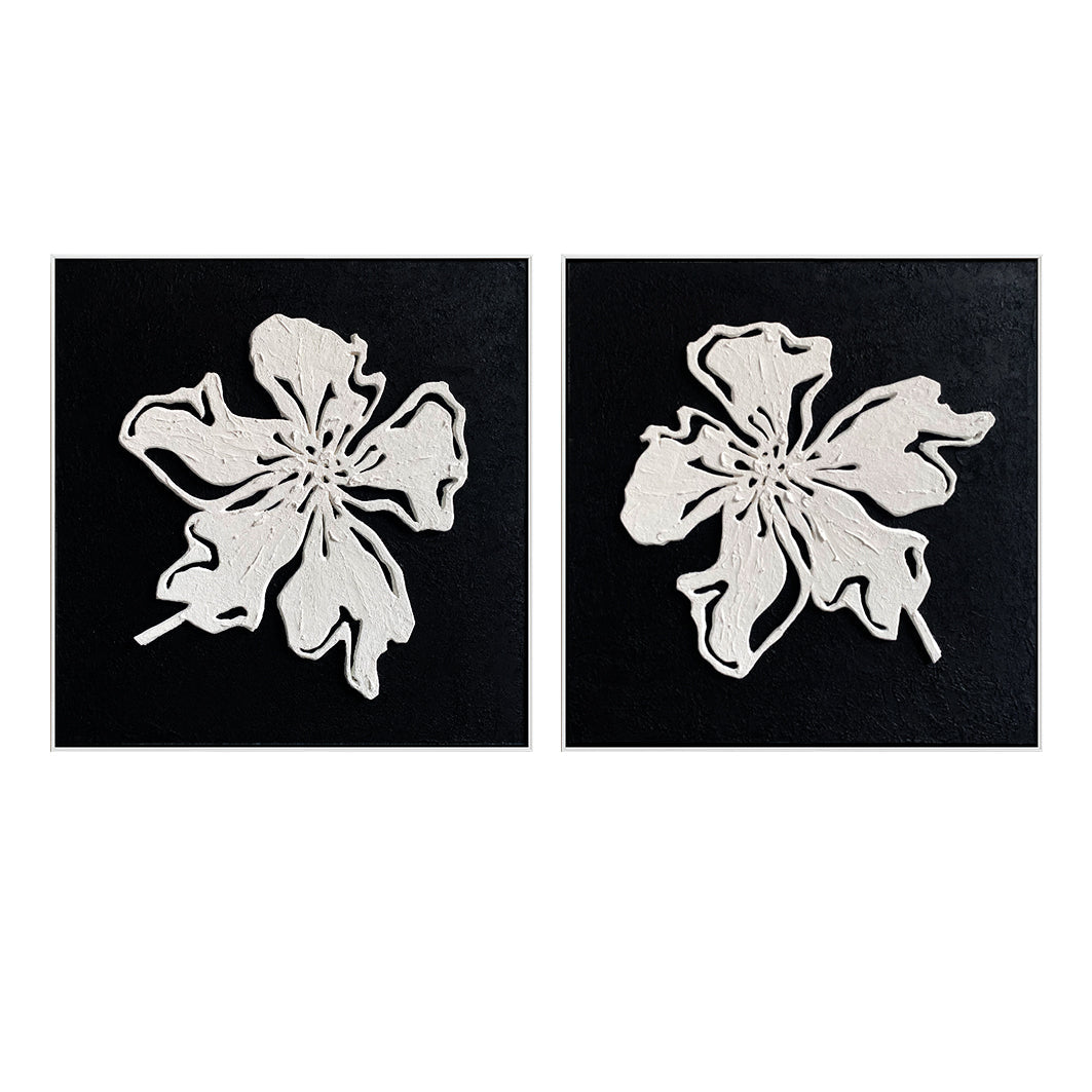 Monochrome Bloom floral canvas wall art diptych with textured white flowers on black background