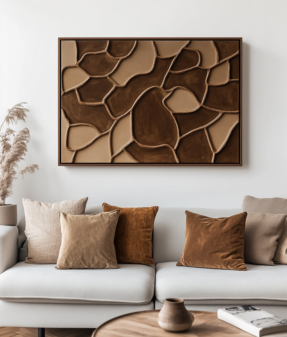 Brown and beige abstract textured wall art with geometric forms.