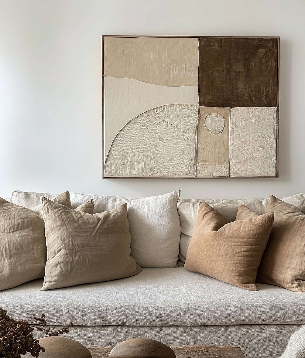 Textured earth tone abstract wall decor with beige, brown, and cream tones.