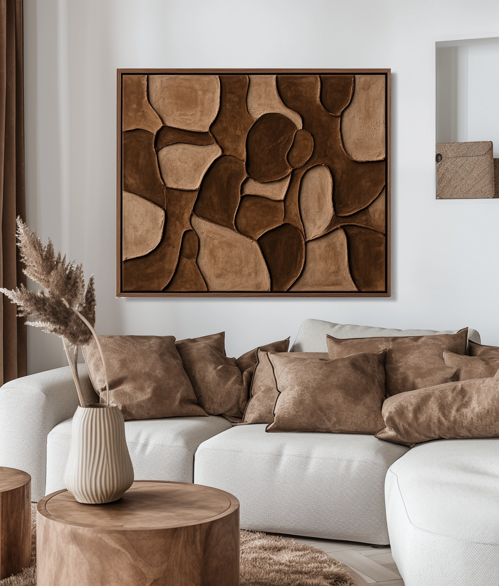 Abstract textured wall art in neutral tones with organic shapes.