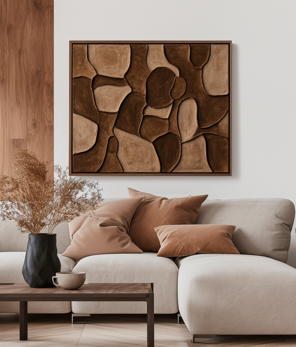 Abstract textured wall art in neutral tones with organic shapes.