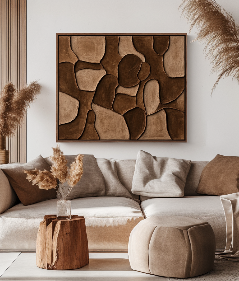 Abstract textured wall art in neutral tones with organic shapes.