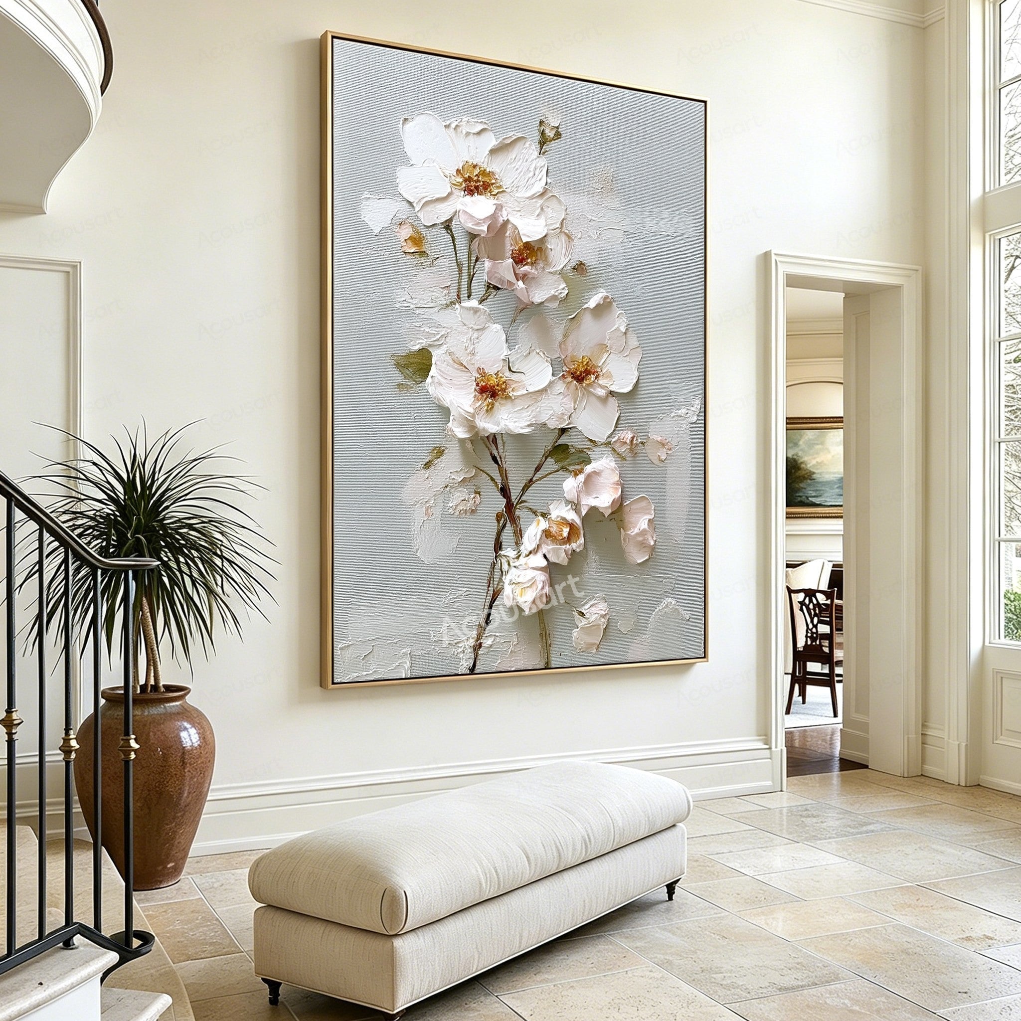 White textured floral wall art with blush flowers, gold centers, green leaves, and brown branches on a pale blue-gray background