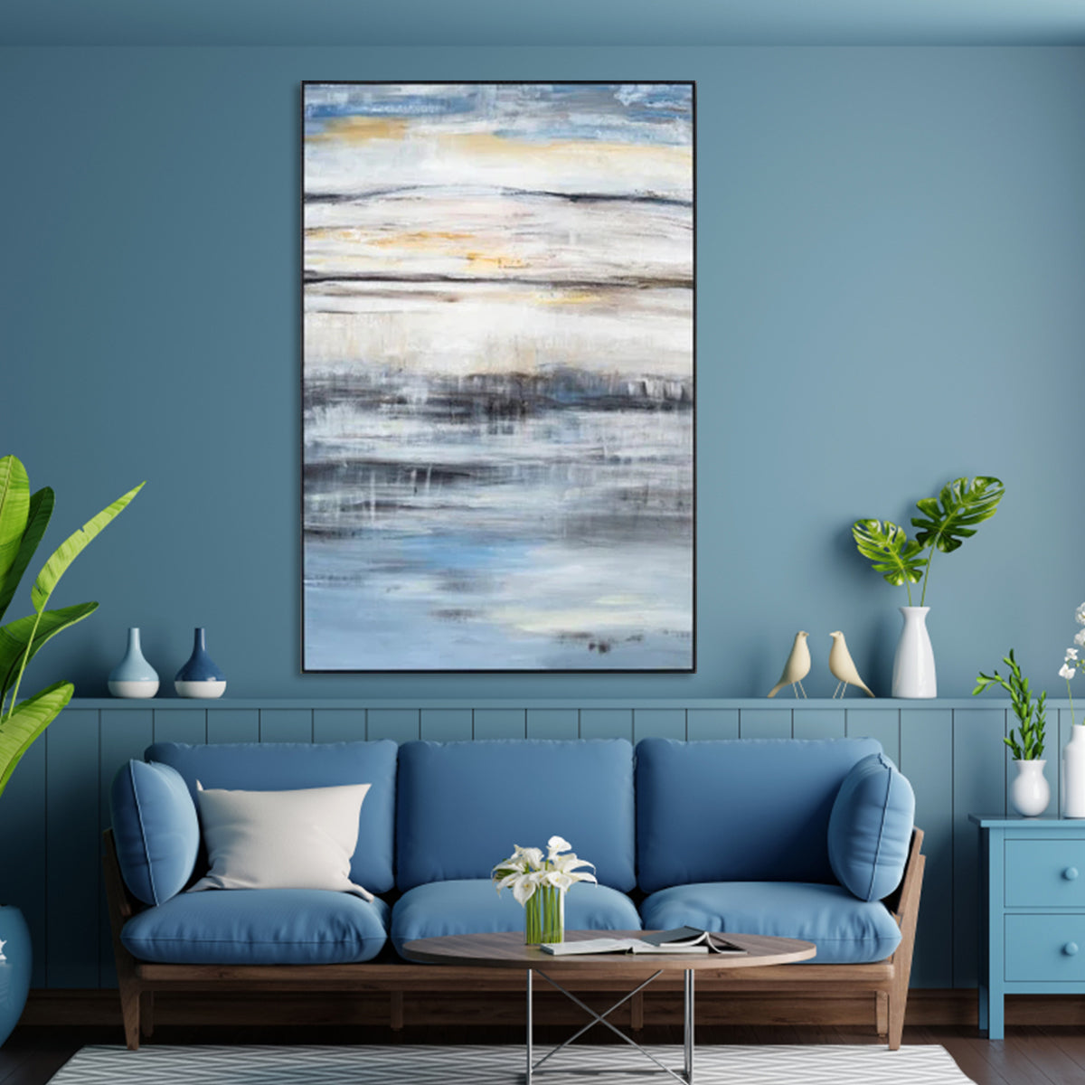 Abstract blue and white wall art with soft waves and a serene ocean horizon.