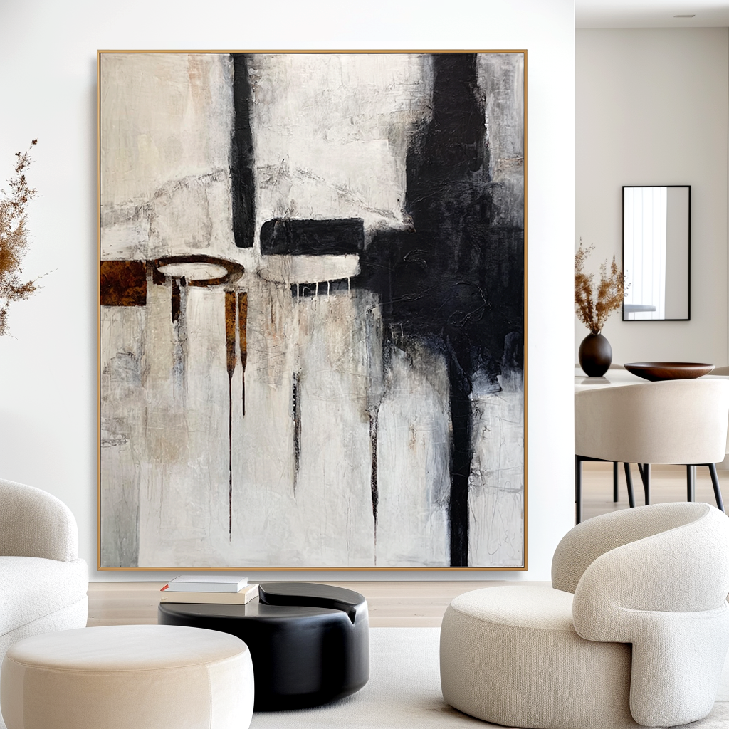 Abstract black, white, and brown geometric art with paint drips and textured elements.