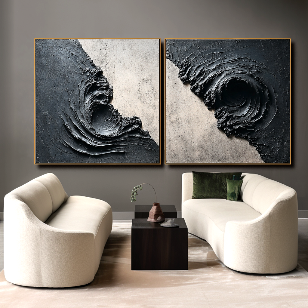 Textured abstract artwork featuring swirling black and gray tones resembling a whirlpool.