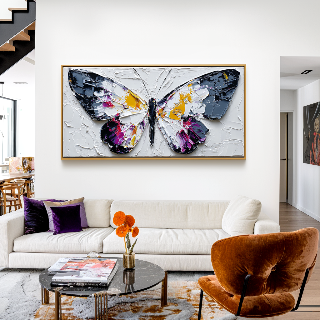 Textured butterfly painting with vibrant colors on canvas