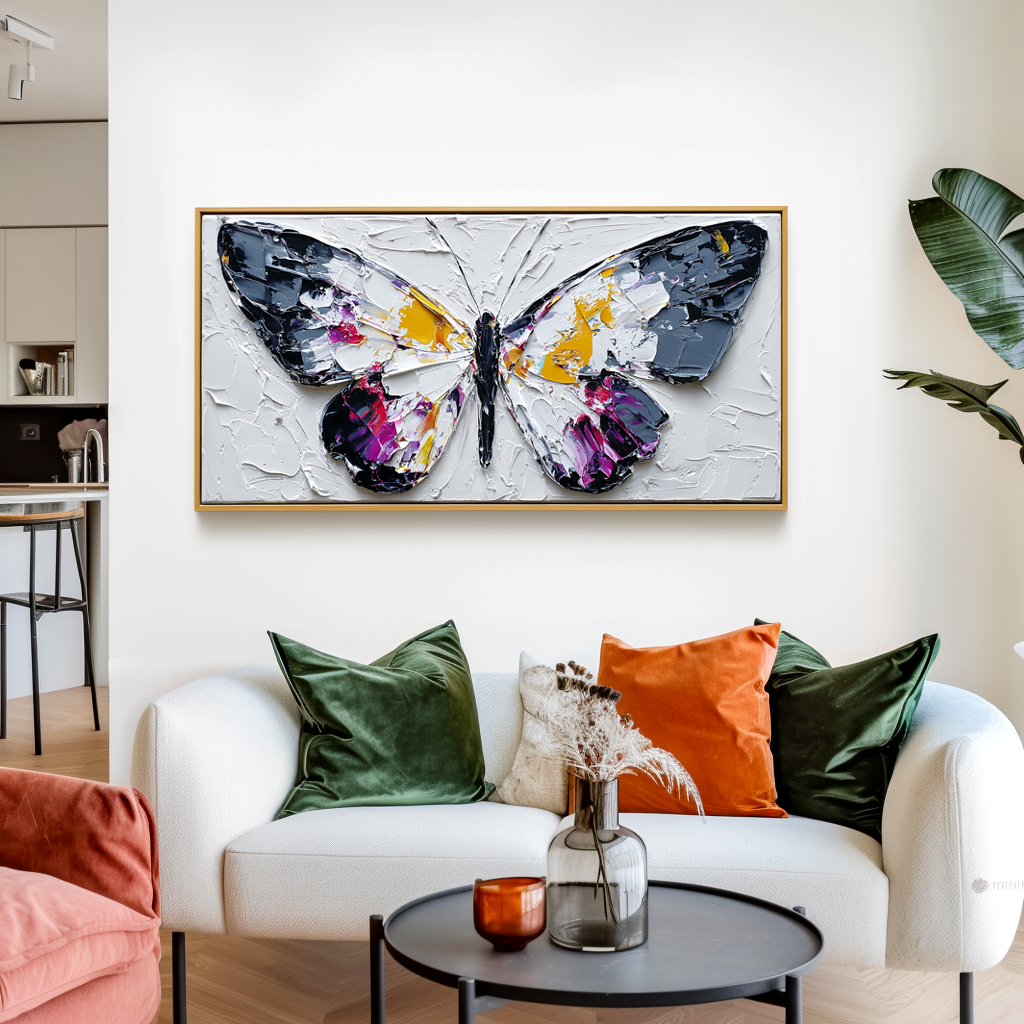 Textured butterfly painting with vibrant colors on canvas