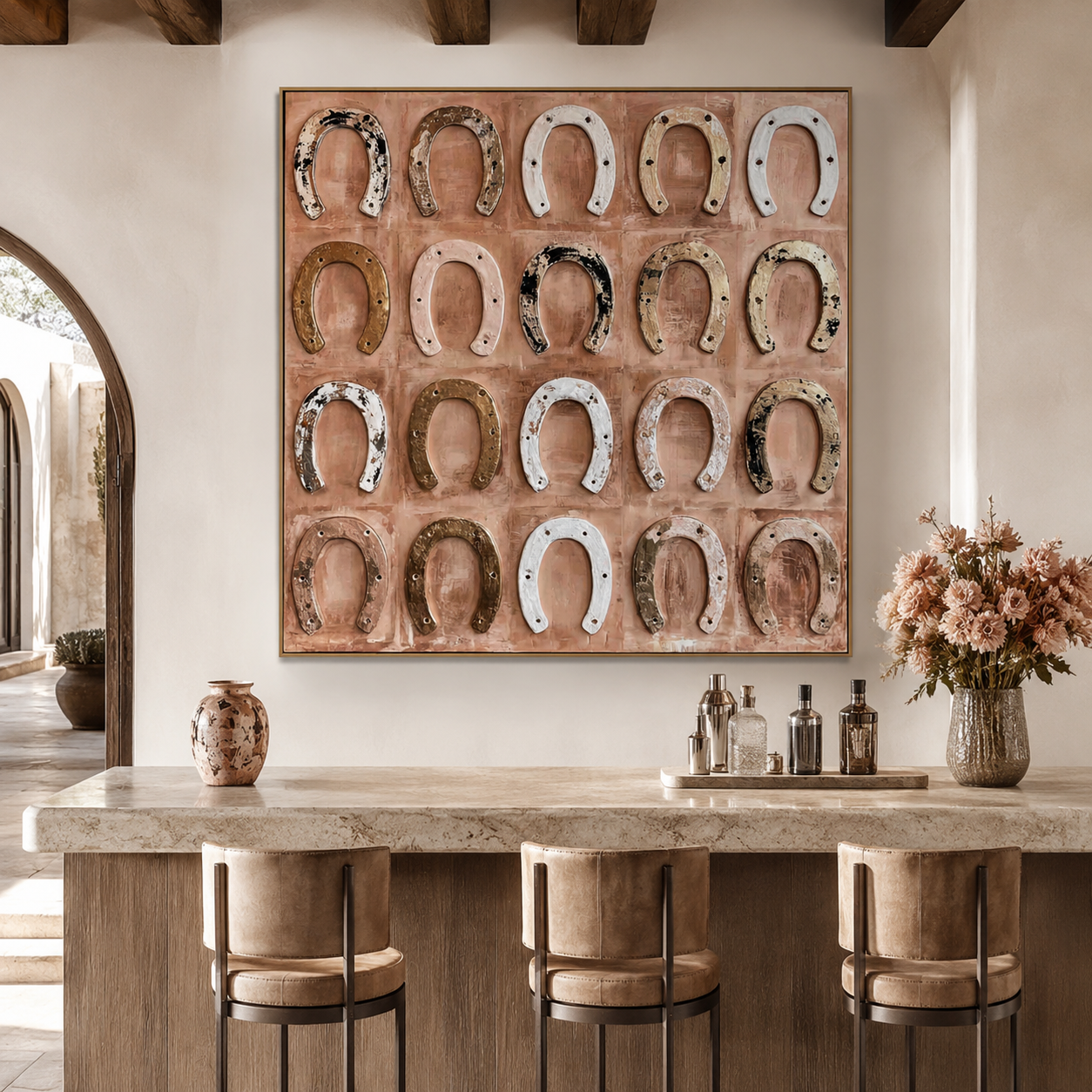 Rustic textured horseshoe wall art with vintage western horseshoes on warm blush beige background