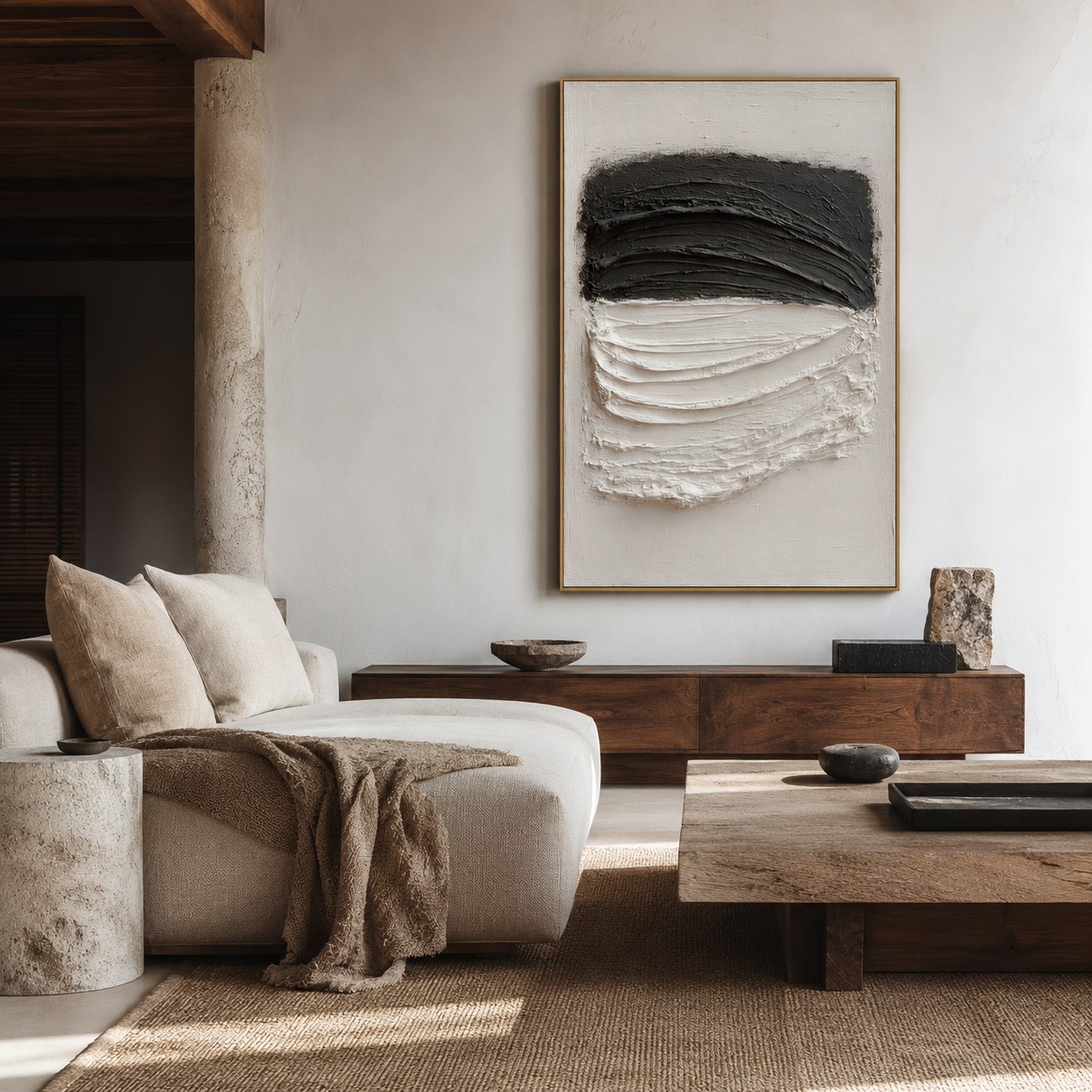 Black and white textured abstract wall art with layered charcoal and raised white brushstrokes on a neutral background