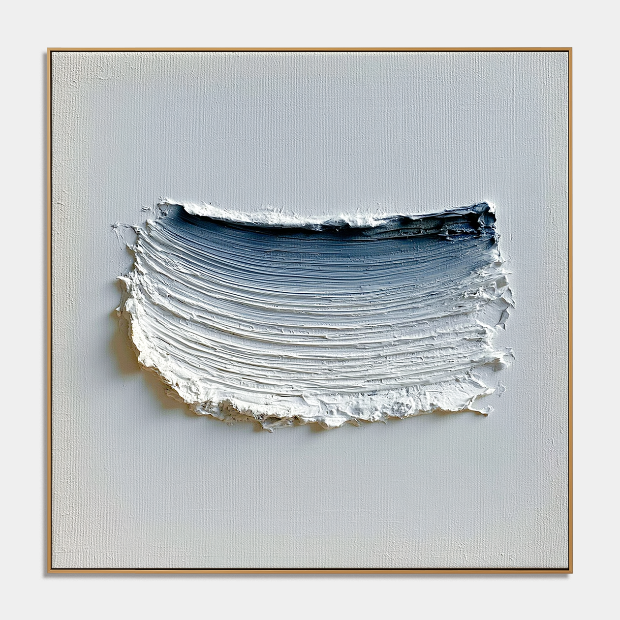 Blue textured abstract wall art with raised white brushstrokes and deep navy accent on a light neutral background