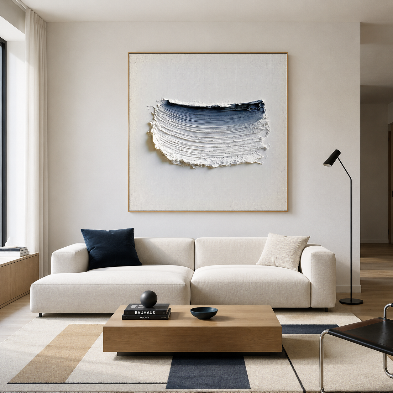 Blue textured abstract wall art with raised white brushstrokes and deep navy accent on a light neutral background