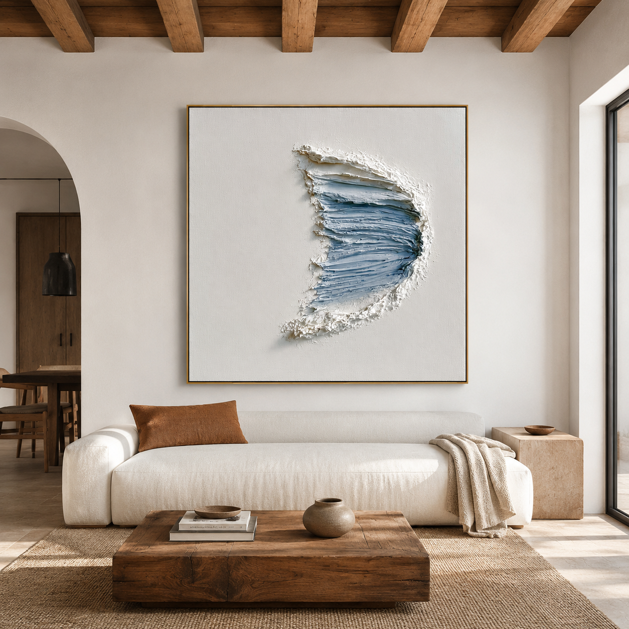 Blue textured abstract wall art with raised crescent brushstrokes in pale blue and white on a neutral background