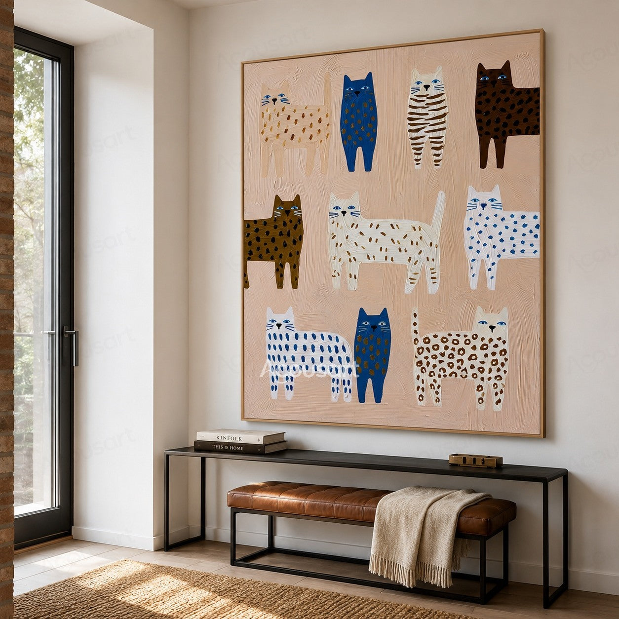 Colorful textured wall art featuring ten blue, white, brown, striped, and spotted cats on a blush beige background