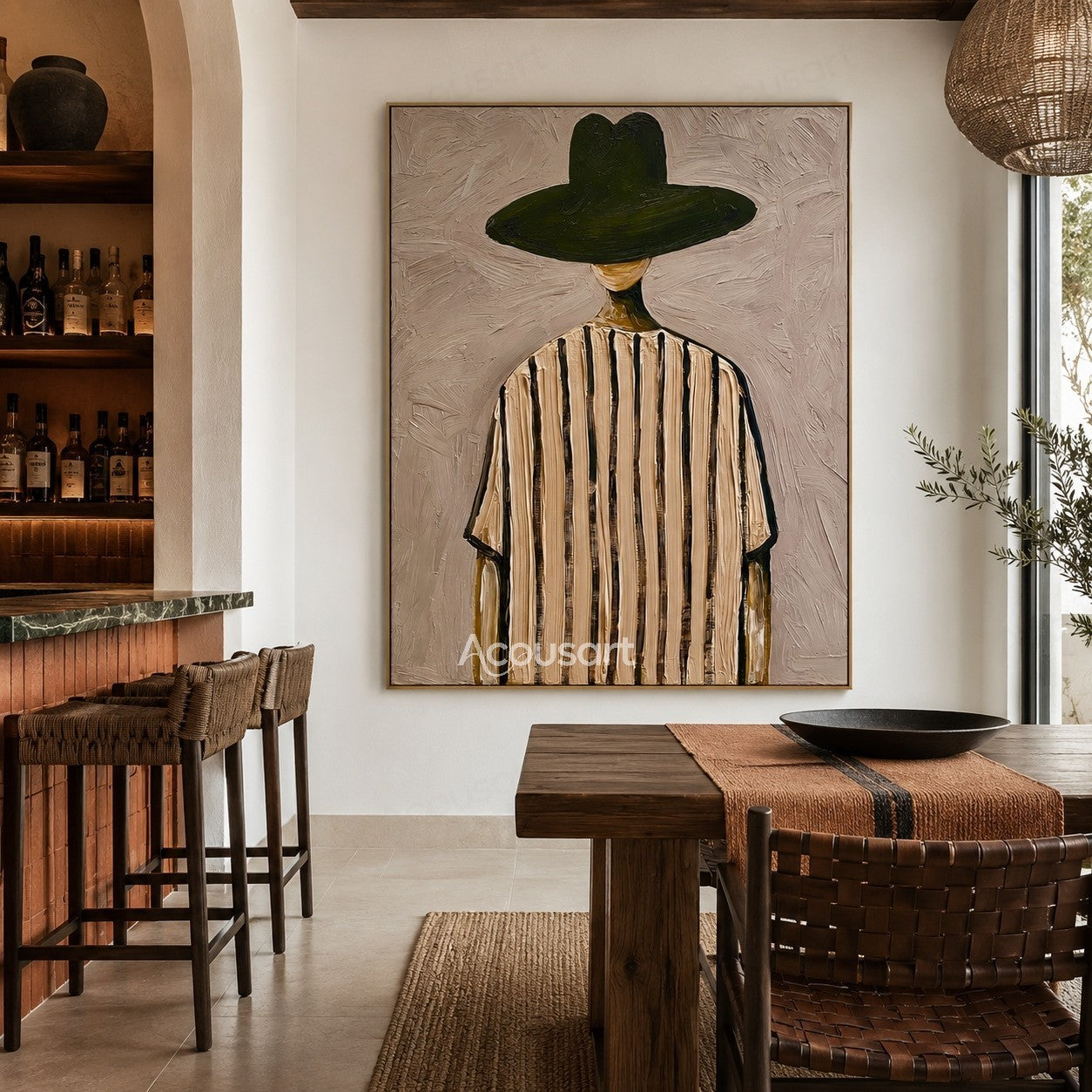 Minimalist back view figure wall art with a wide dark green hat and cream striped clothing on a textured mauve beige background