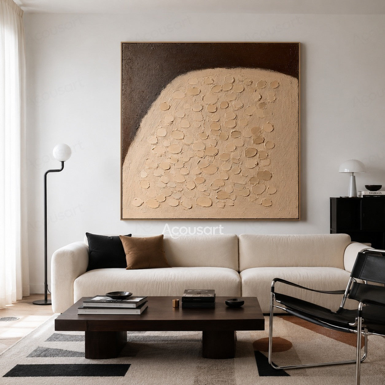 Neutral beige textured abstract wall art with raised pebble-like details and a dark brown charcoal background
