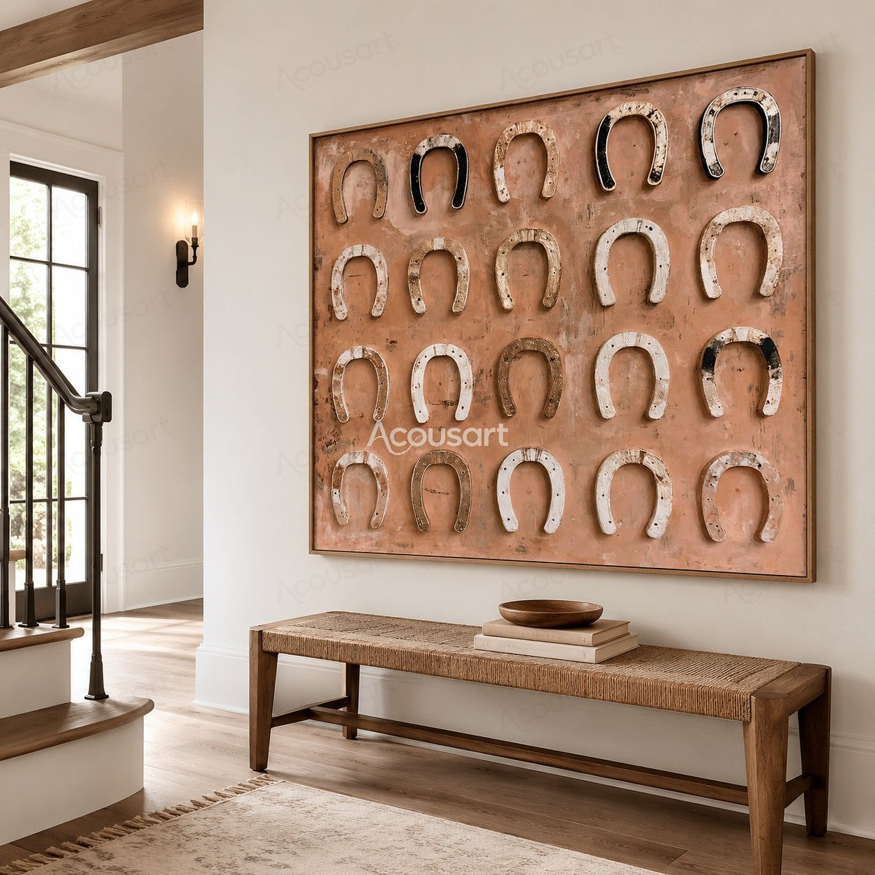 Western horseshoe wall art with vintage horseshoes on a soft peach background