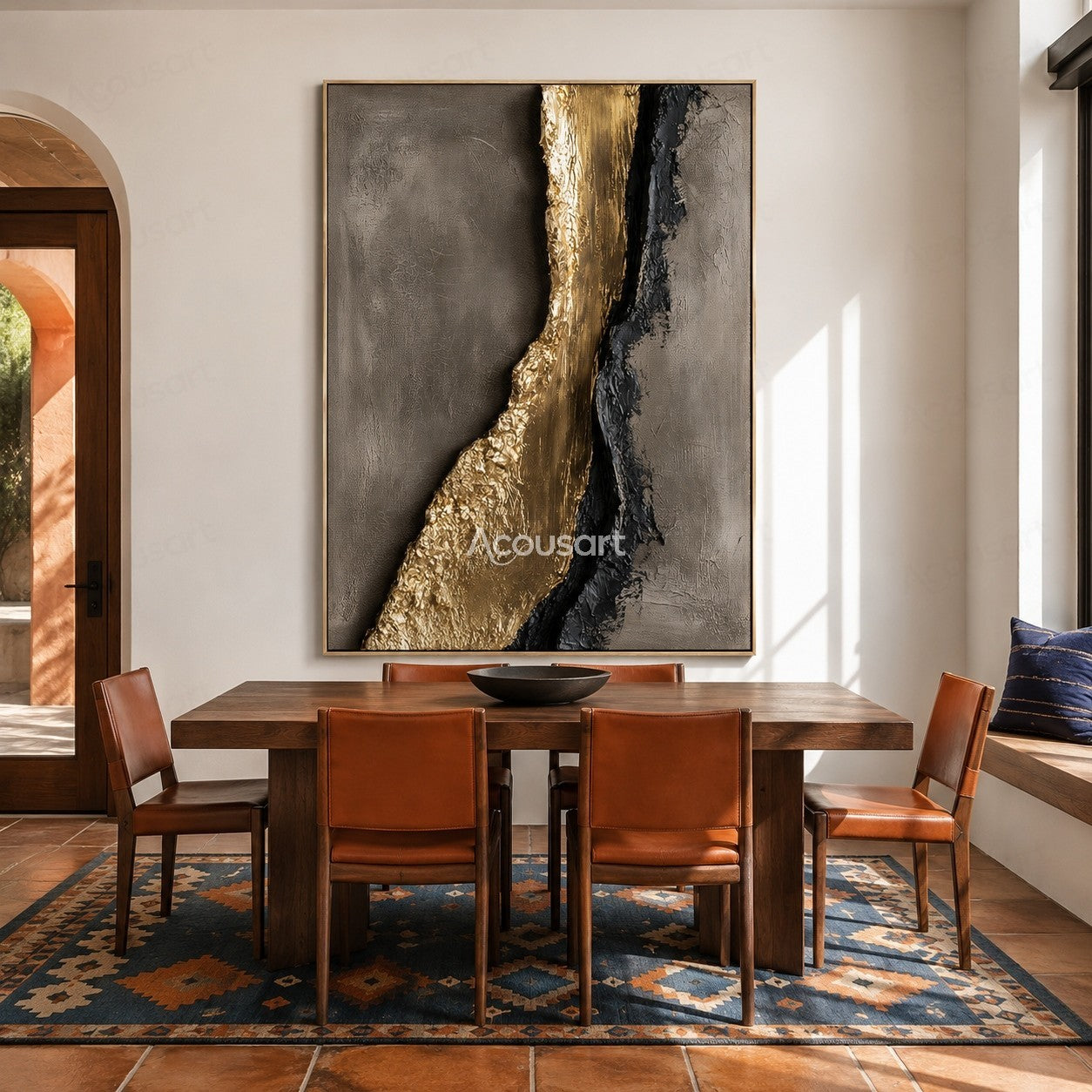 Gold and black textured abstract wall art on a gray background with raised metallic details