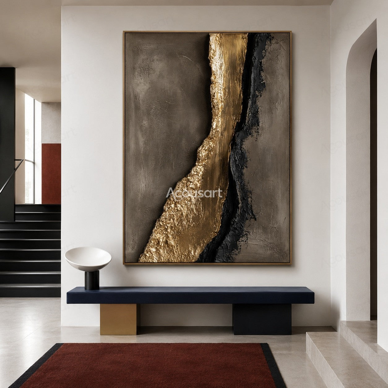 Gold and black textured abstract wall art on a gray background with raised metallic details