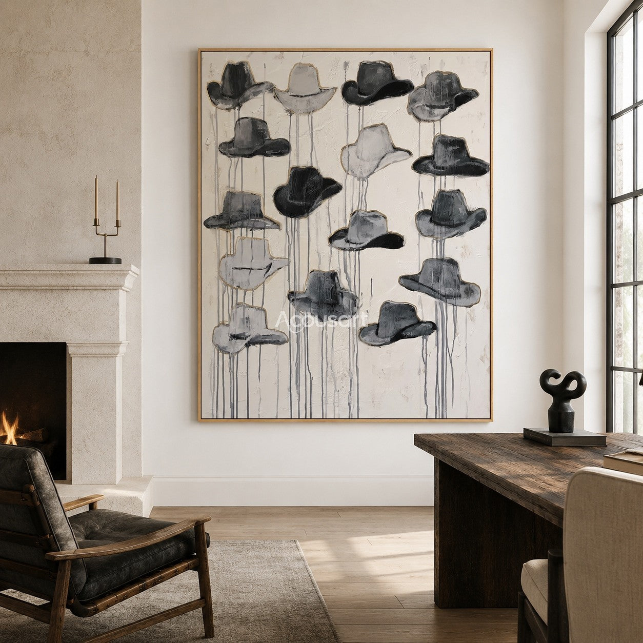 Textured western wall art featuring a collection of black and gray cowboy hats on a neutral background