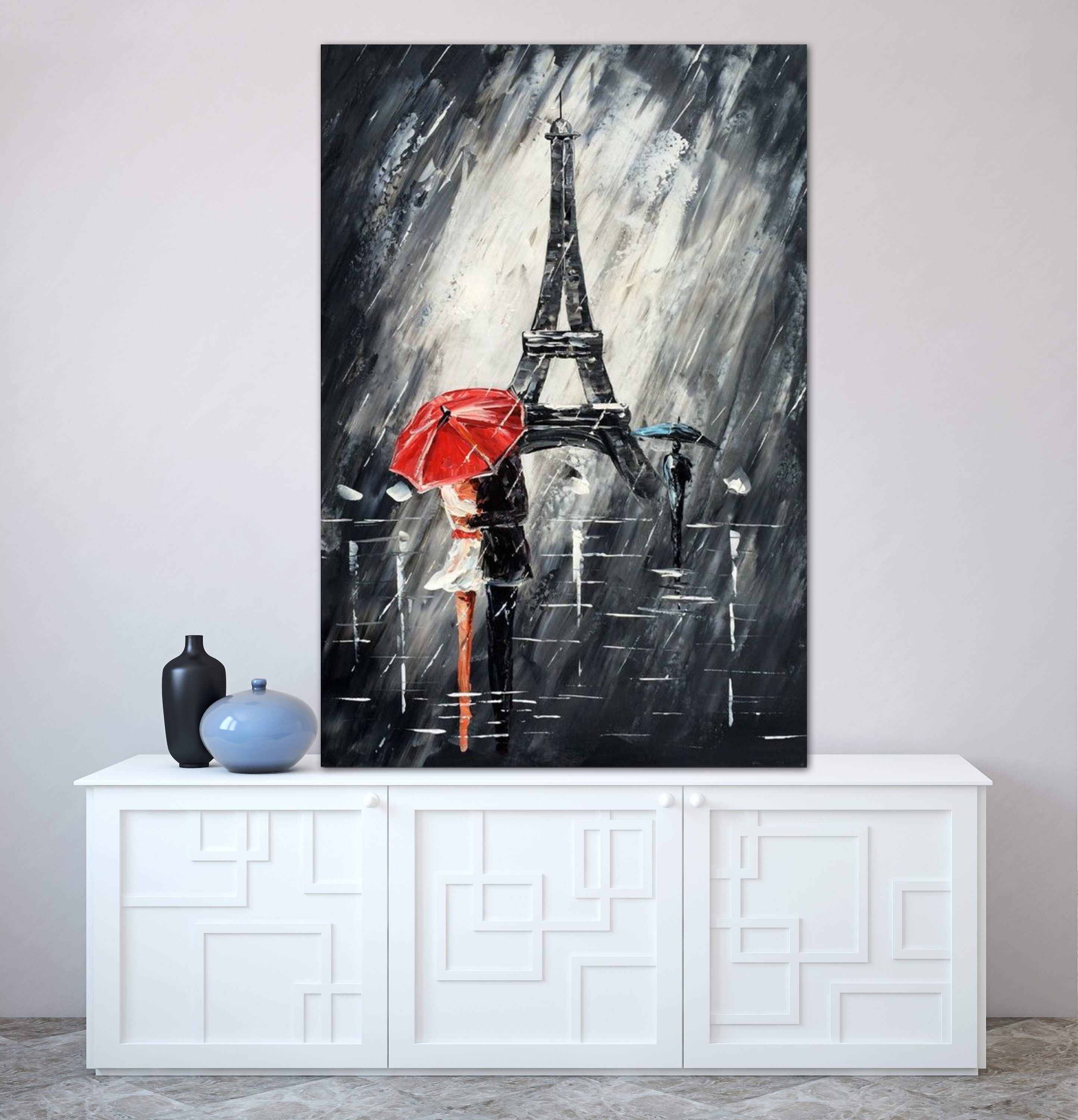 Romantic Eiffel Tower painting with a couple holding umbrellas under the rain in Paris.