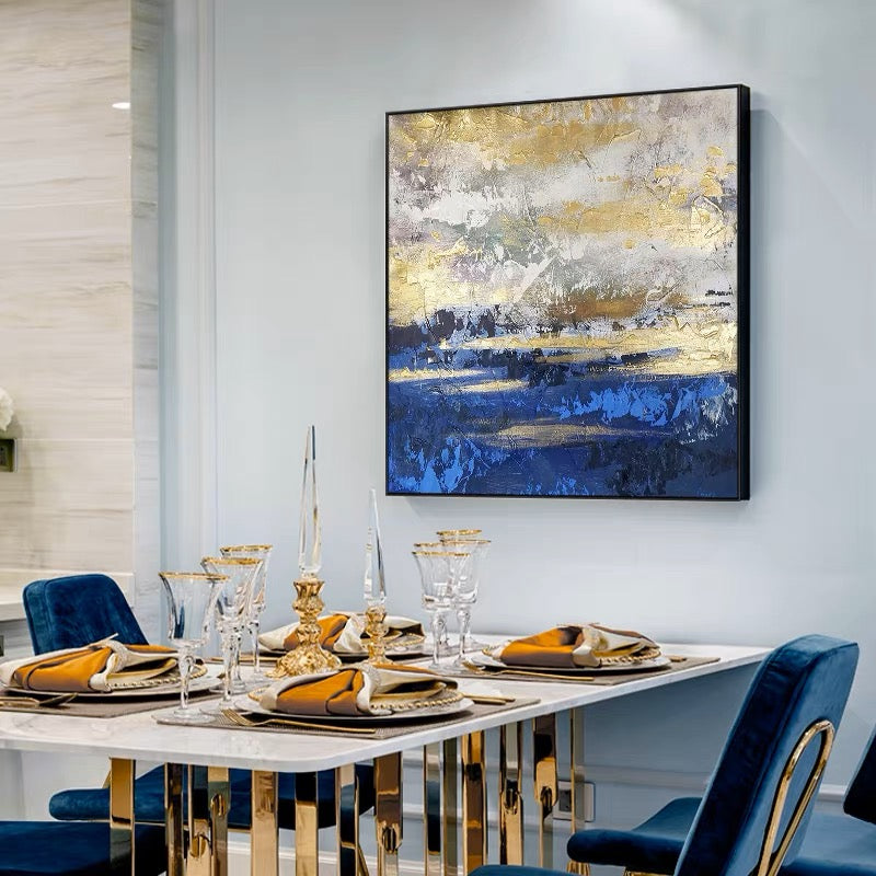 Textured canvas art in blue and gold tones, perfect for modern home decor.