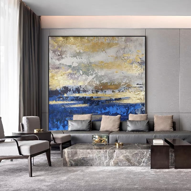 Textured canvas art in blue and gold tones, perfect for modern home decor.