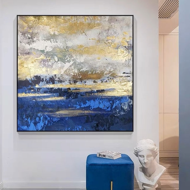 Textured canvas art in blue and gold tones, perfect for modern home decor.