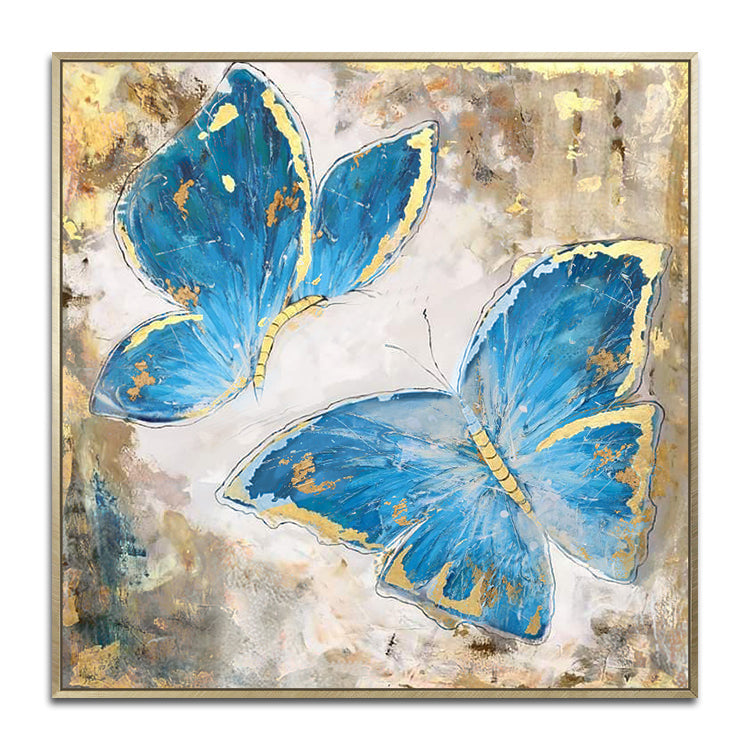 Butterfly canvas art with two blue butterflies accented by gold on textured background