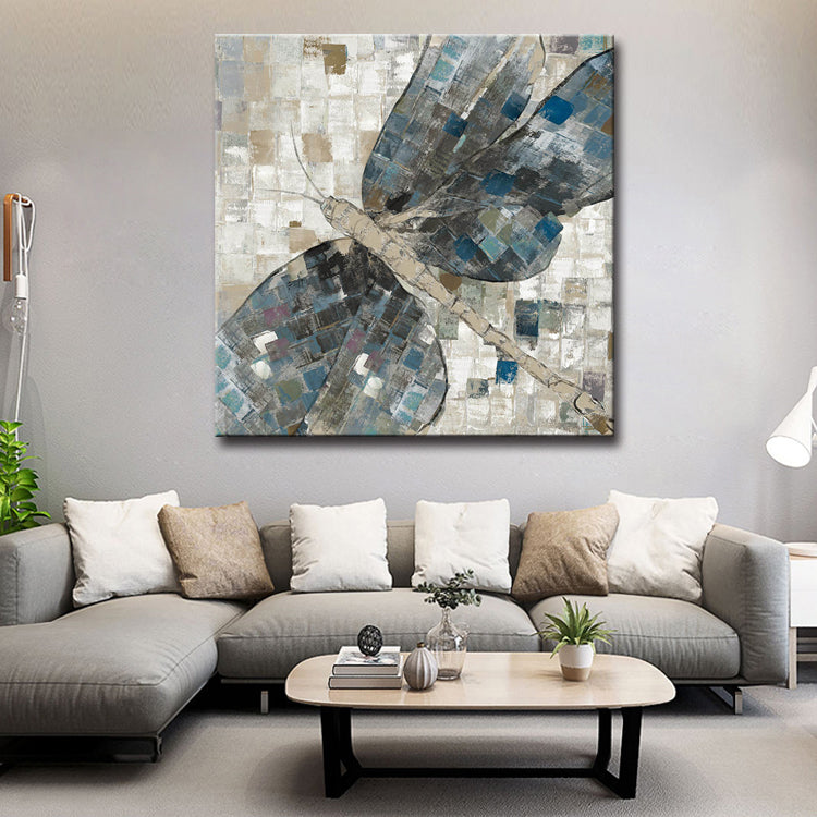 Abstract dragonfly wall art painting with textured blue and gray wings, modern oil canvas décor