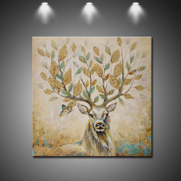 Deer wall art with antlers as tree branches and golden leaves, butterflies flying