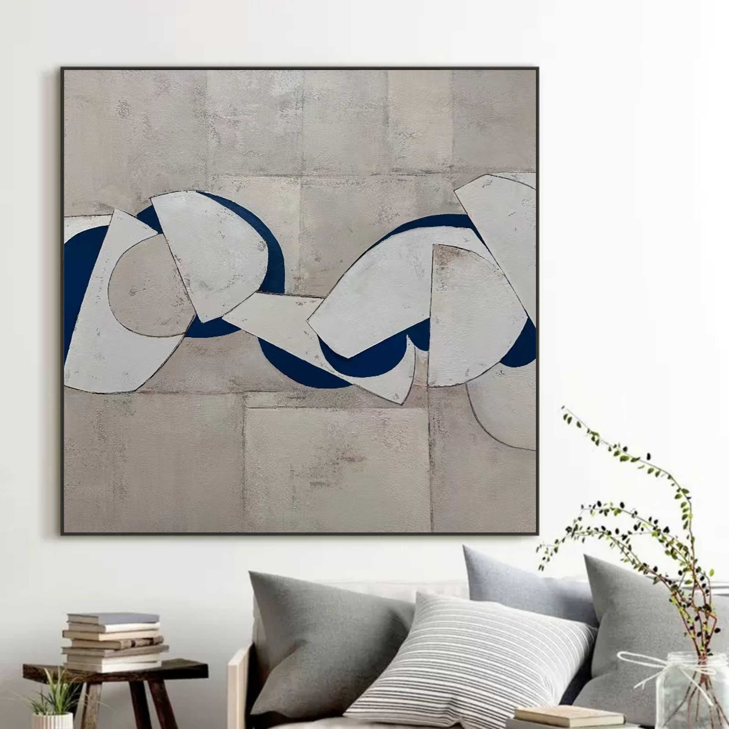 Blue and white abstract painting with bold curved shapes on textured gray background